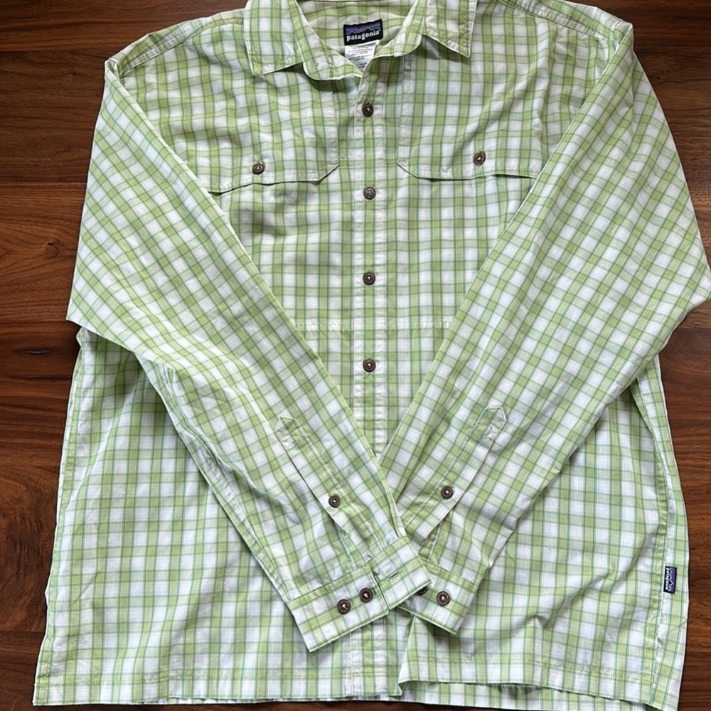 Two mens Patagonia fishing shirts